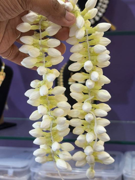Artificial Mulla Mala jasmine garland made from processed paper, traditional hair accessory for women.