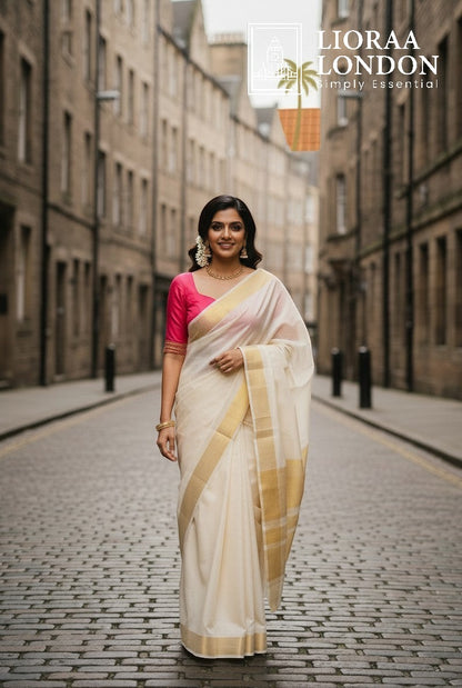Lioraa London Ltd gajri pink cotton silk blouse with sweetheart neckline worn with a cream and gold saree on a street